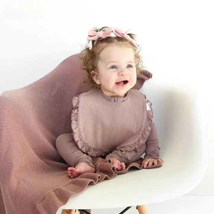 RUFFLE SNAP BIB
