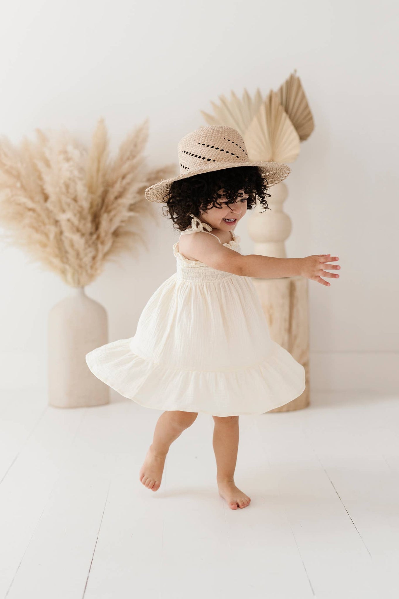 cream tiered mini dress Love Triangle Milkmaid Tiered Mini Dress in Cream ditsy-Multi