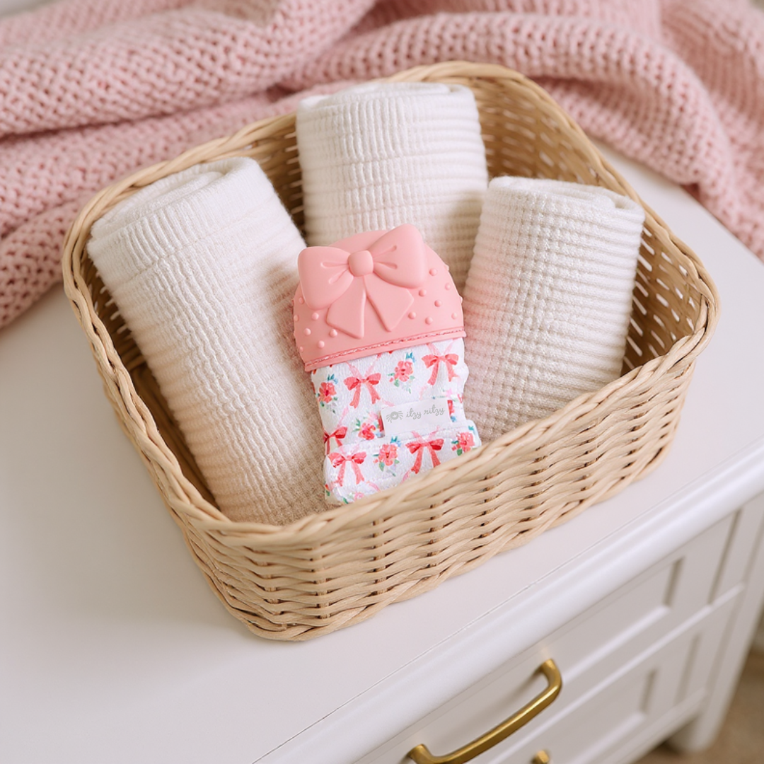 Itzy Mitt™ Silicone Teething Mitt - Bow