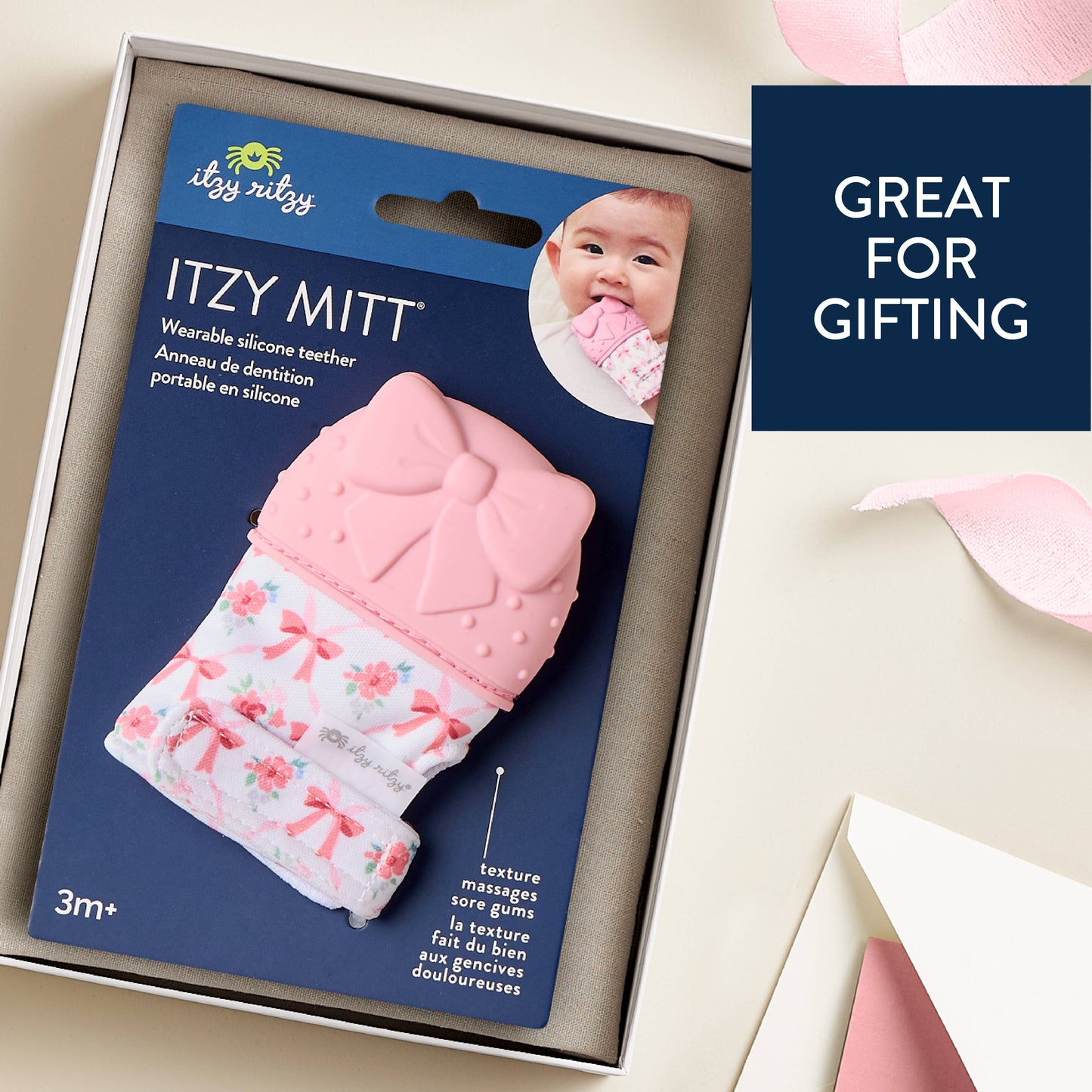 Itzy Mitt™ Silicone Teething Mitt - Bow